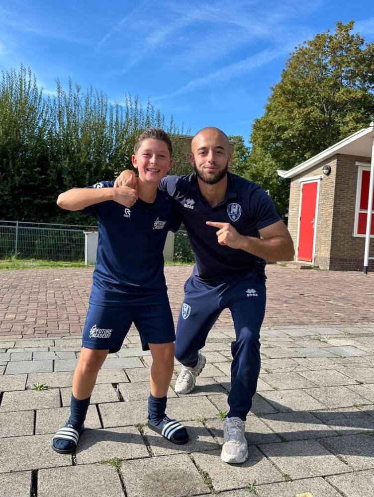 Aiman Achemlal met een speler